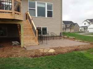 concrete patio and wooden deck